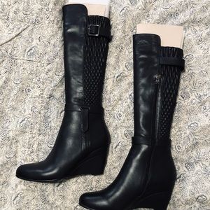 The Solemani Tally Wedge Boots